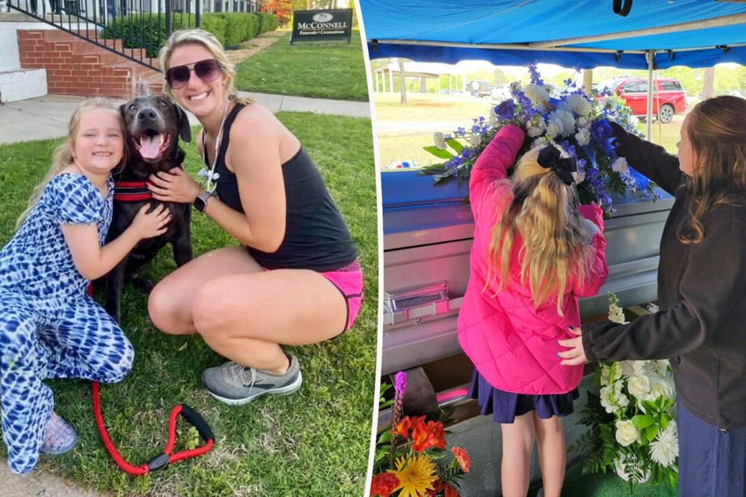 Jogger and Dog Comfort Heartbroken Child Outside Funeral of Dad Who Died of Cancer
