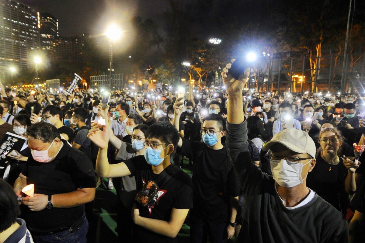 Thousands of participants take part in a memorial vigil in Victoria Park on June 4, 2020, in Hong Kong to honor the victims of the 1989 Tiananmen Square massacre. (Sung Pi-lung/The Epoch Times)