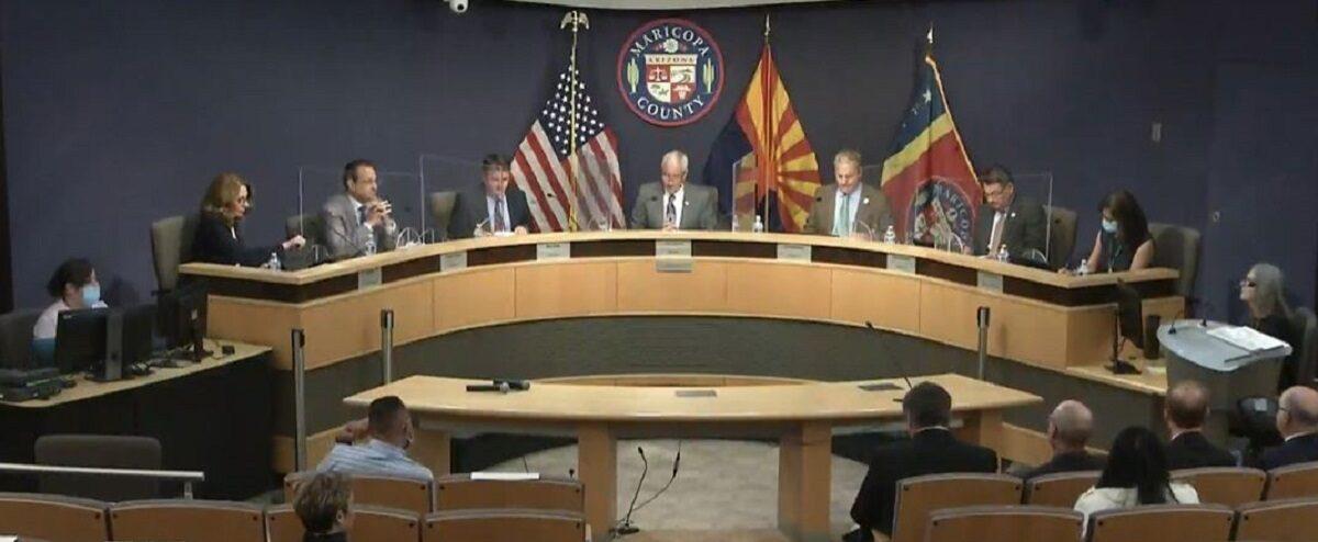 In this image from a video captured from the Maricopa County Board of Supervisors website, Chairman Jack Sellers, center, and members hold a meeting regarding requests by the Arizona Senate in Maricopa County, Ariz., on May 18, 2021. (Screenshot via The Epoch Times)