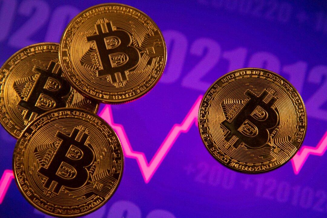 Bitcoin Tops $60,000, Nears Record High, on Growing US ETF Hopes