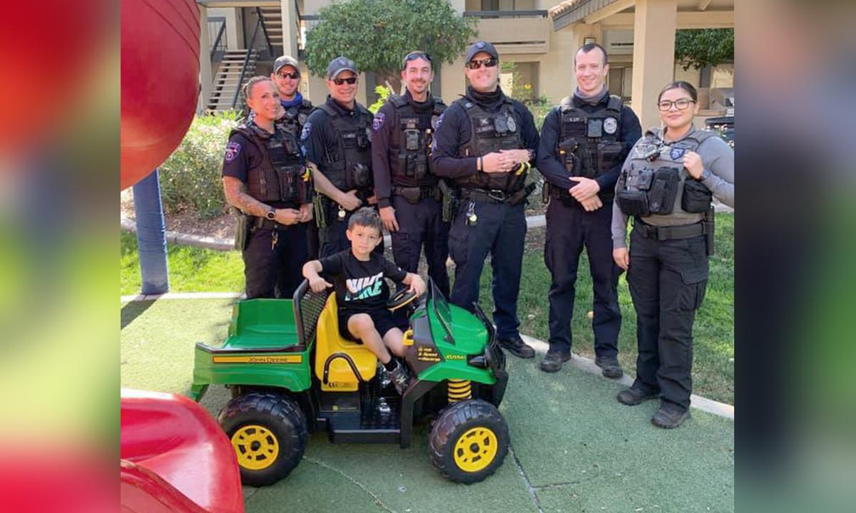 Police Officers Answer Family’s Prayer, Gift Gator Tractor Toy to Boy After His Was Stolen