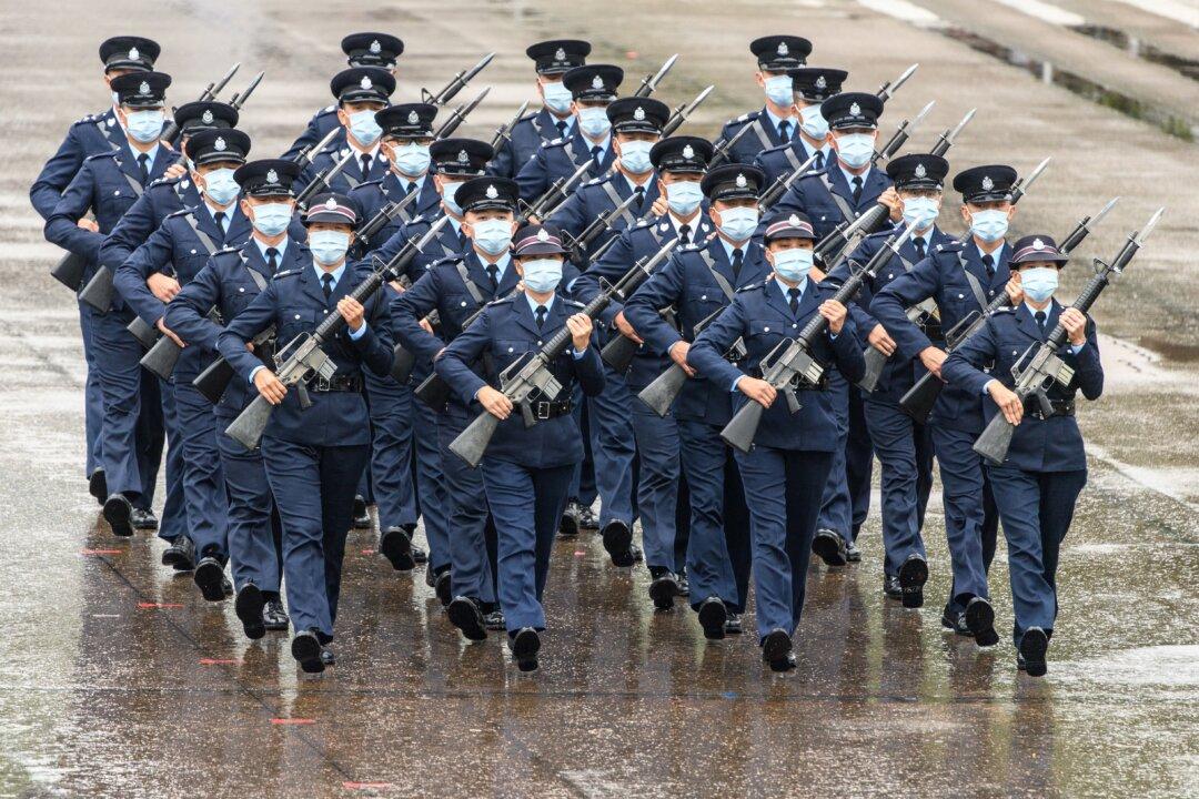 China Picks ‘Wolf Warrior’ Diplomat to Oversee Hong Kong’s Foreign Affairs