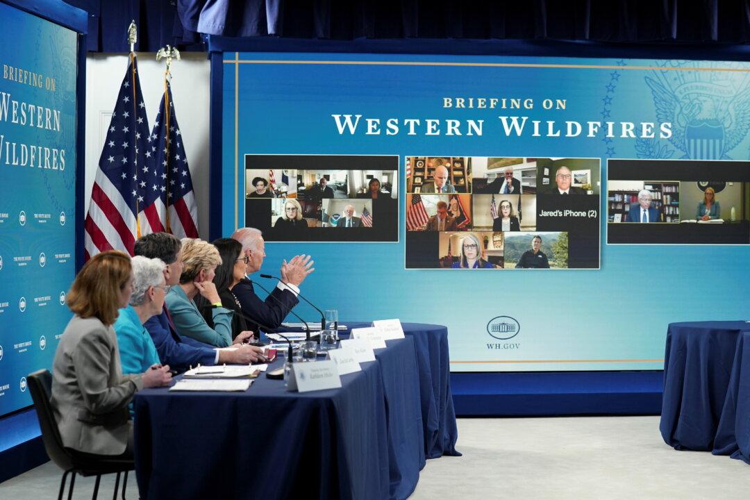 Biden Ups Firefighter Pay, Pushes Climate Spending