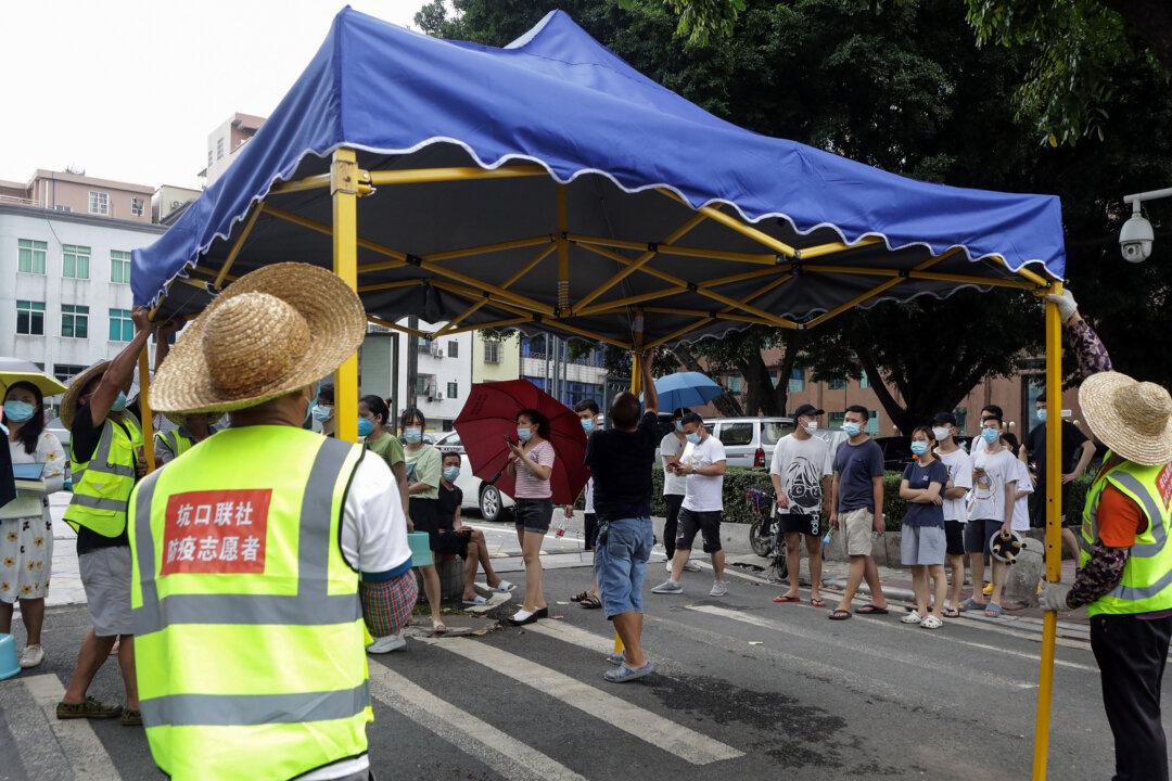 COVID-19 Spreads in China’s Guangdong Province, Cities in Semi-Lockdown