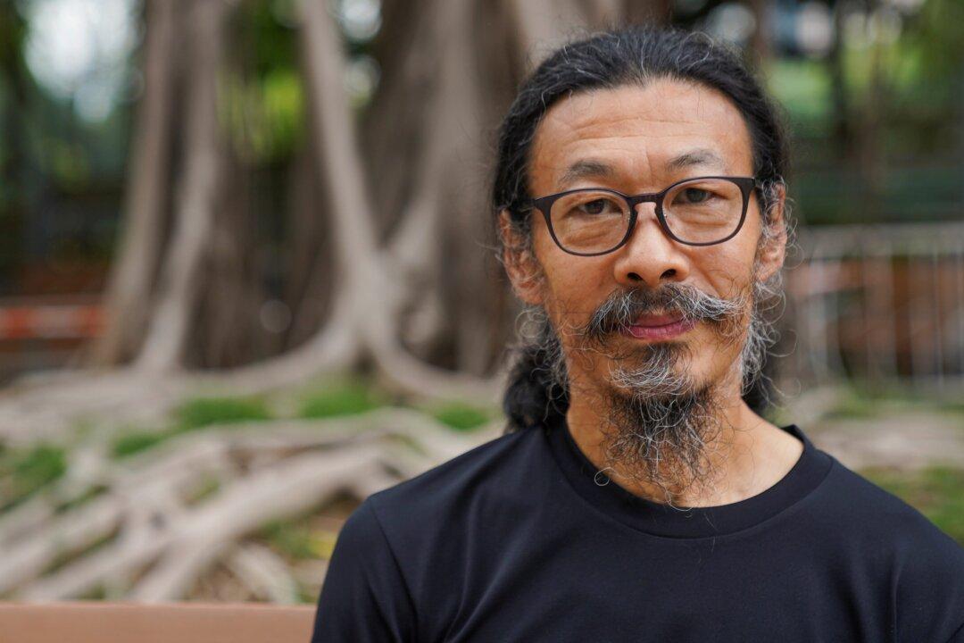 Hong Kong Not Dead Yet, Says Tiananmen Veteran Taking Lone Stand in Park for June 4 Vigil