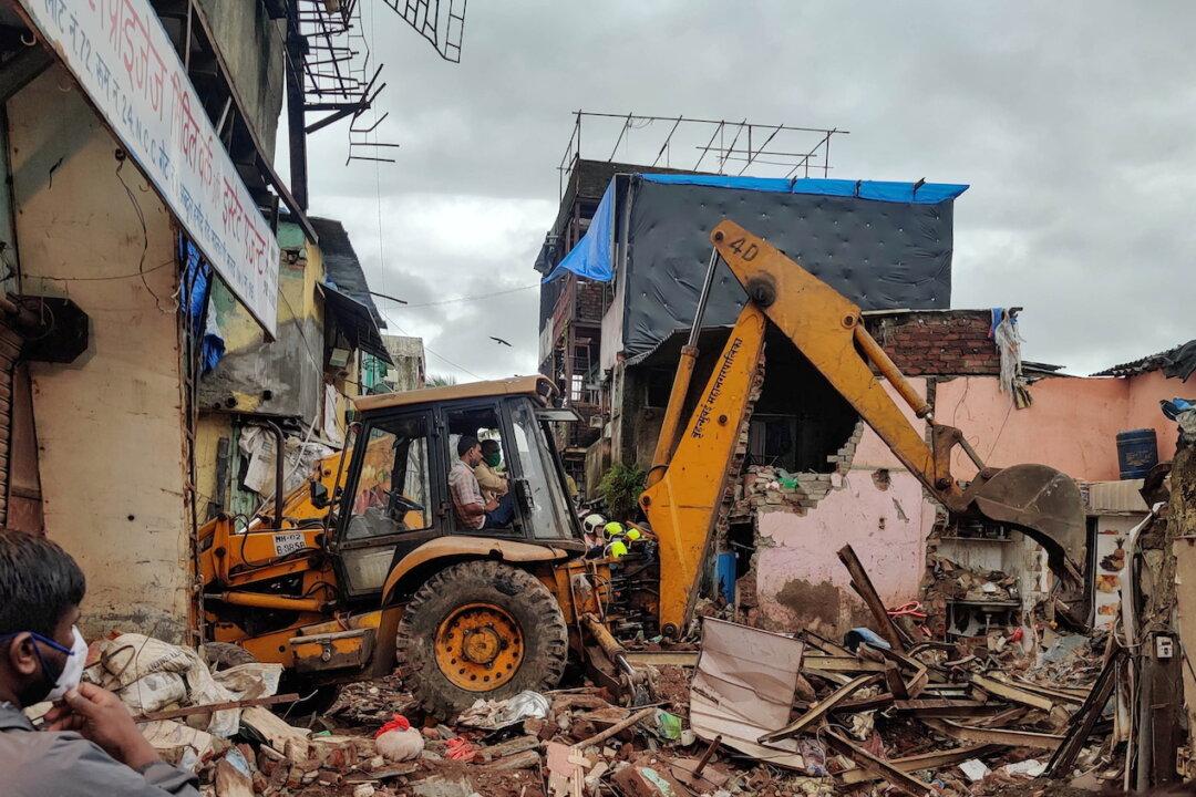 Building Collapse in Mumbai Kills 11, Including 8 Children, Rescuers Search for Survivors