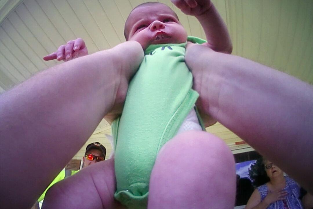 Police Body Cam Shows 3-Week-Old Choking, Turning Purple—Before Officer Saves the Day