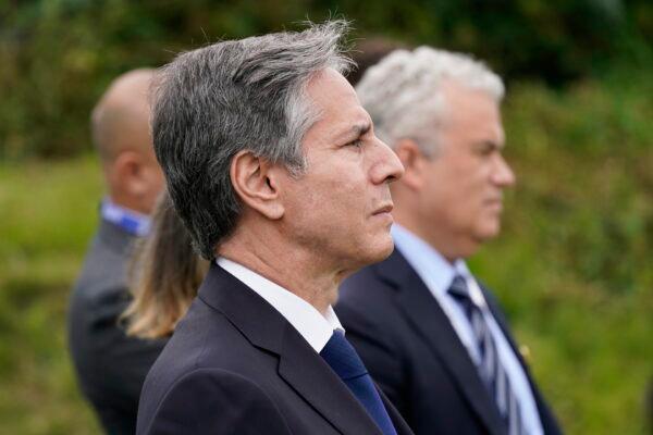 Secretary of State Antony Blinken listens as President Joe Biden speaks about his administration's global COVID-19 vaccination efforts ahead of the G-7 summit, in St. Ives, England, on June 10, 2021. (Patrick Semansky/AP Photo)