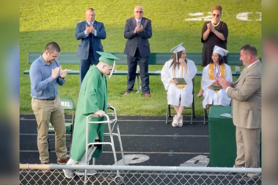 High School Senior Paralyzed Playing Football Walks Across Stage During Grad Ceremony