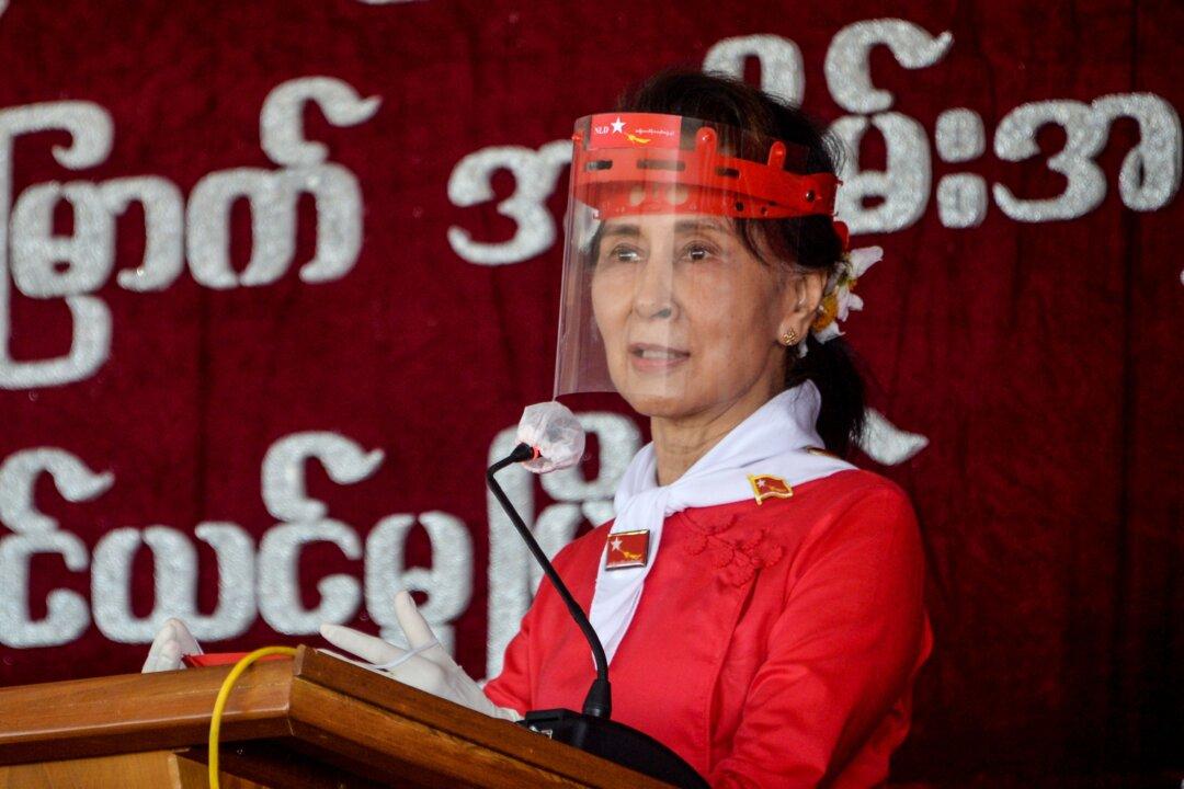 Burma Puts Suu Kyi on Trial on Charges Critics Call Bogus