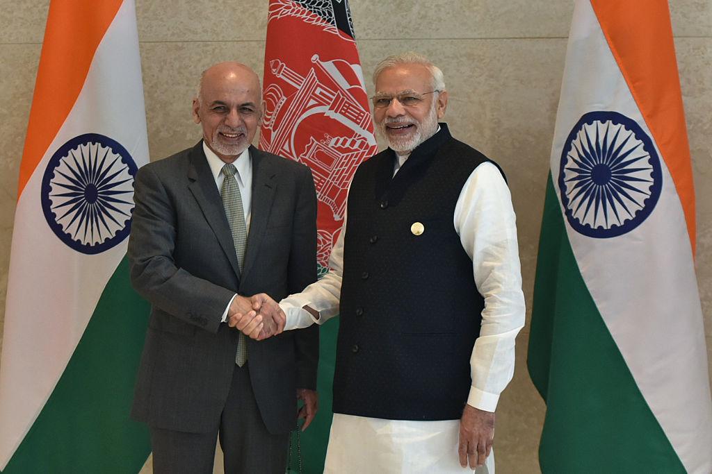 Indian Prime Minister Narendra Modi (R) shakes hands with Afghan President Ashraf Ghani (L) during the 6th Heart of Asia (HoA) Ministerial Conference in Amritsar, India. on Dec. 4, 2016. (Narinder Nanu/AFP via Getty Images)