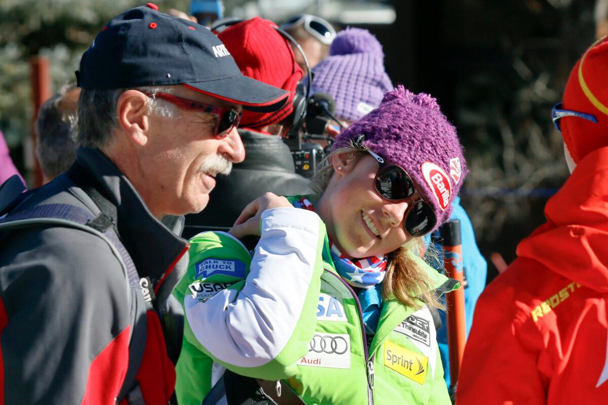 Mikaela Shiffrin (C) talks with her ski technician (R) along with her father, Jeff Shiffrin (L) after a practice run for the women's World Cup ski race in Aspen, Colo., on Nov. 23, 2012. (Nathan Bilow/AP Photo)
