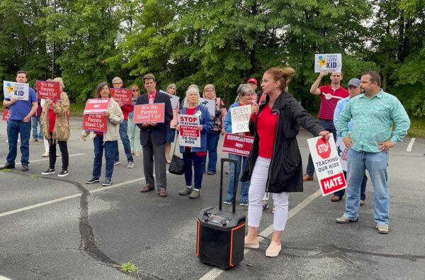 Patti Hidalgo Menders speaks at a rally outside the Loudoun County Public School administration building in Ashburn, Va., on Jun. 22, 2021. (Terri Wu/The Epoch Times)
