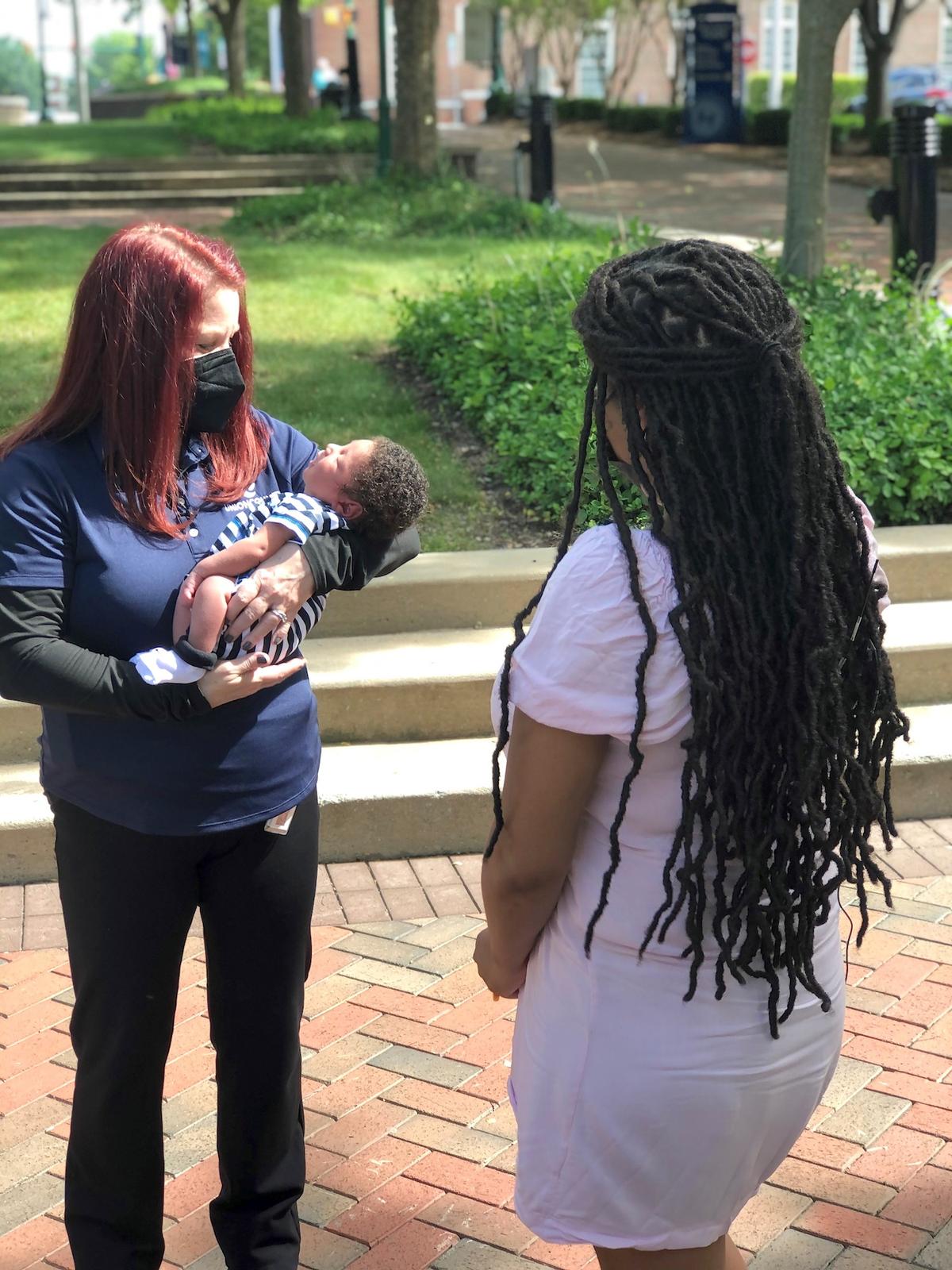Union County dispatcher Keri Michaels meets Samantha Lockhart and her baby. (Courtesy of <a href="https://www.unioncountync.gov/">Union County Government</a>)