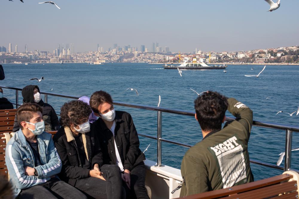 Passengers travel on the Eminonu-Kadikoy ferry on Feb. 22, 2021. (tolgaildun/Shutterstock)