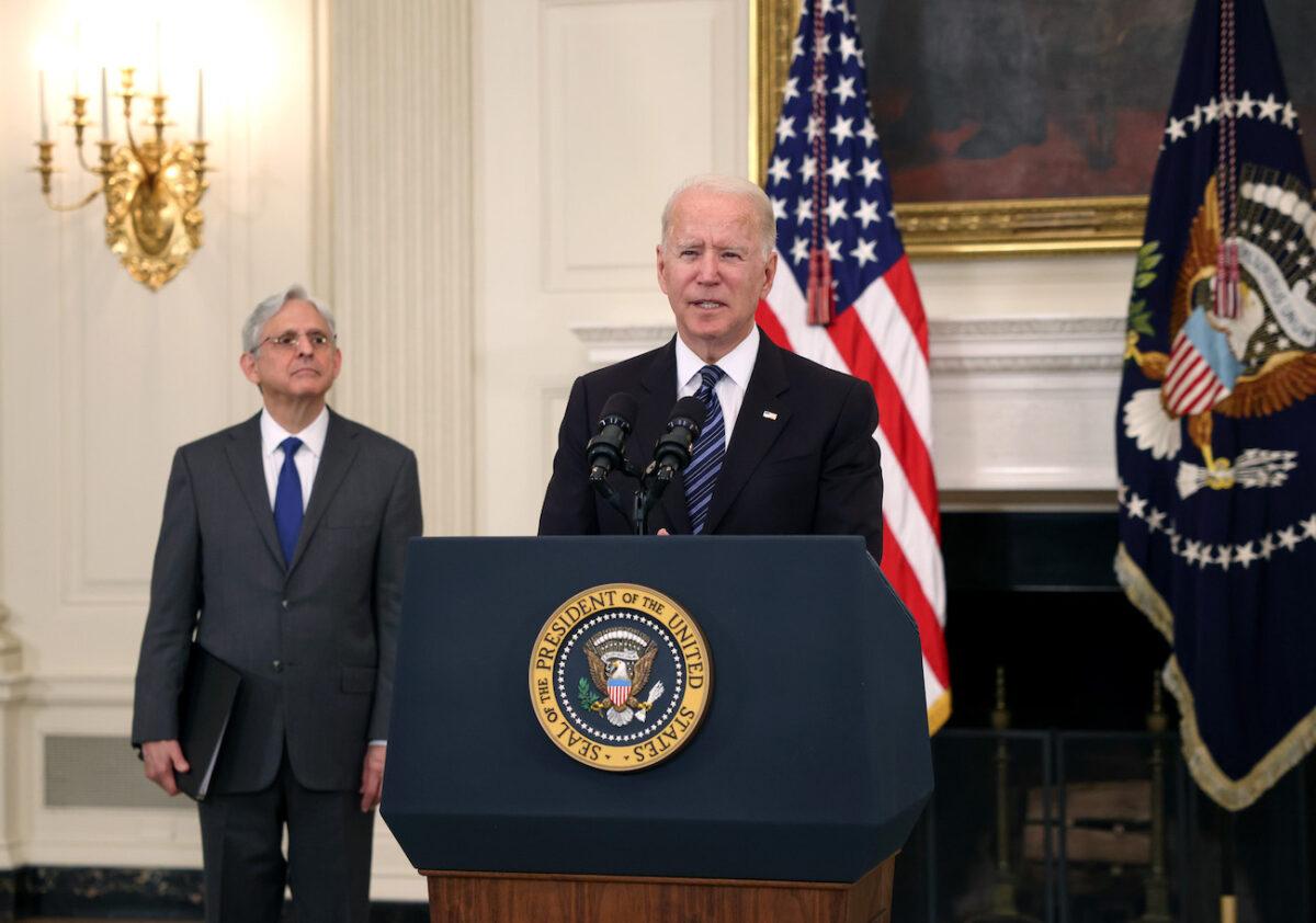 President Joe Biden speaks on gun crime prevention measures as Attorney General Merrick Garland looks on at the White House in Washington on June 23, 2021. (Kevin Dietsch/Getty Images)