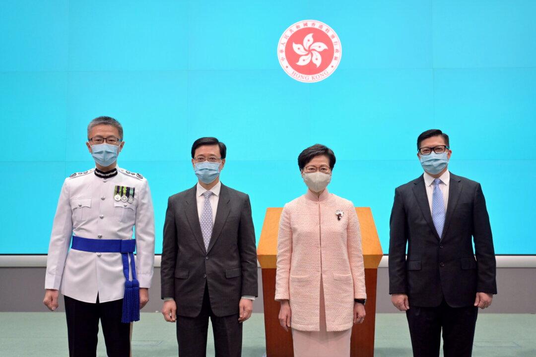 Beijing Promotes Security Officials to Senior Roles in Hong Kong