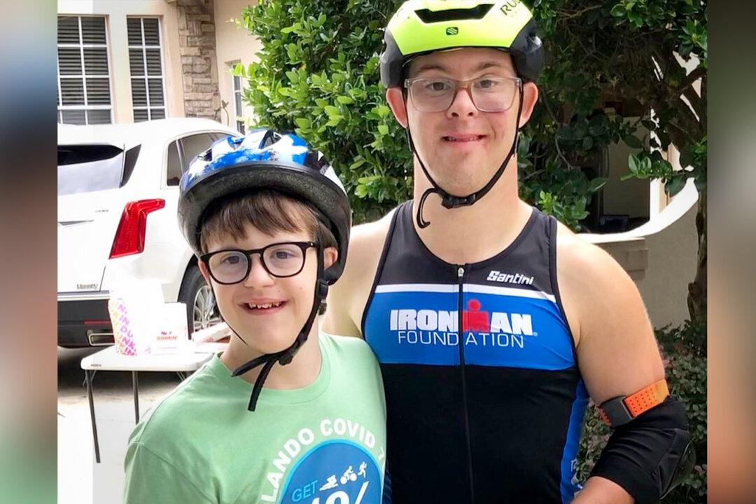 14-Year-Old With Down Syndrome Completes Mini-Triathlon After Meeting His Ironman Inspiration
