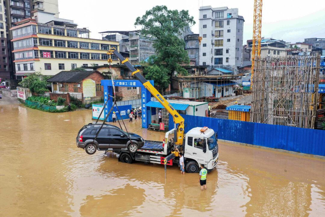 Heavy Rain Hits Over One Million in Southern China but State Broadcaster Highlights Local Waterfall Instead
