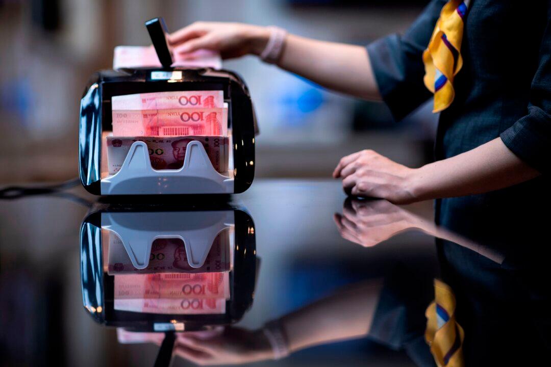 China’s Bank Regulator Warns of Rising Bad Loans Due to Uneven Recovery