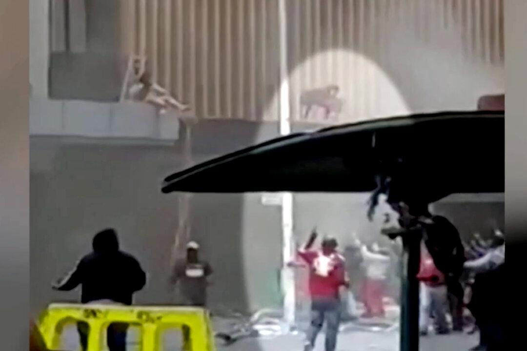 South African Mother Throws Baby to Safety From Burning Building