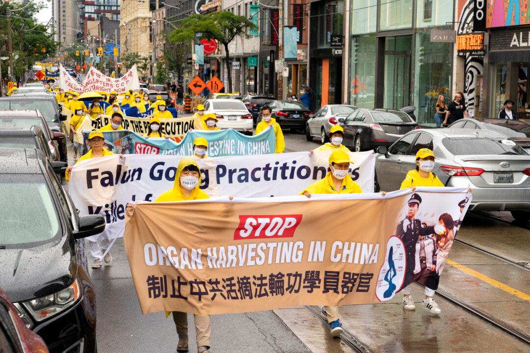 Hundreds Join Toronto Parade Marking 22 Years of Falun Gong Persecution in China