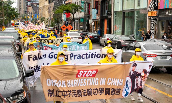 Hundreds Join Toronto Parade Marking 22 Years of Falun Gong Persecution in China