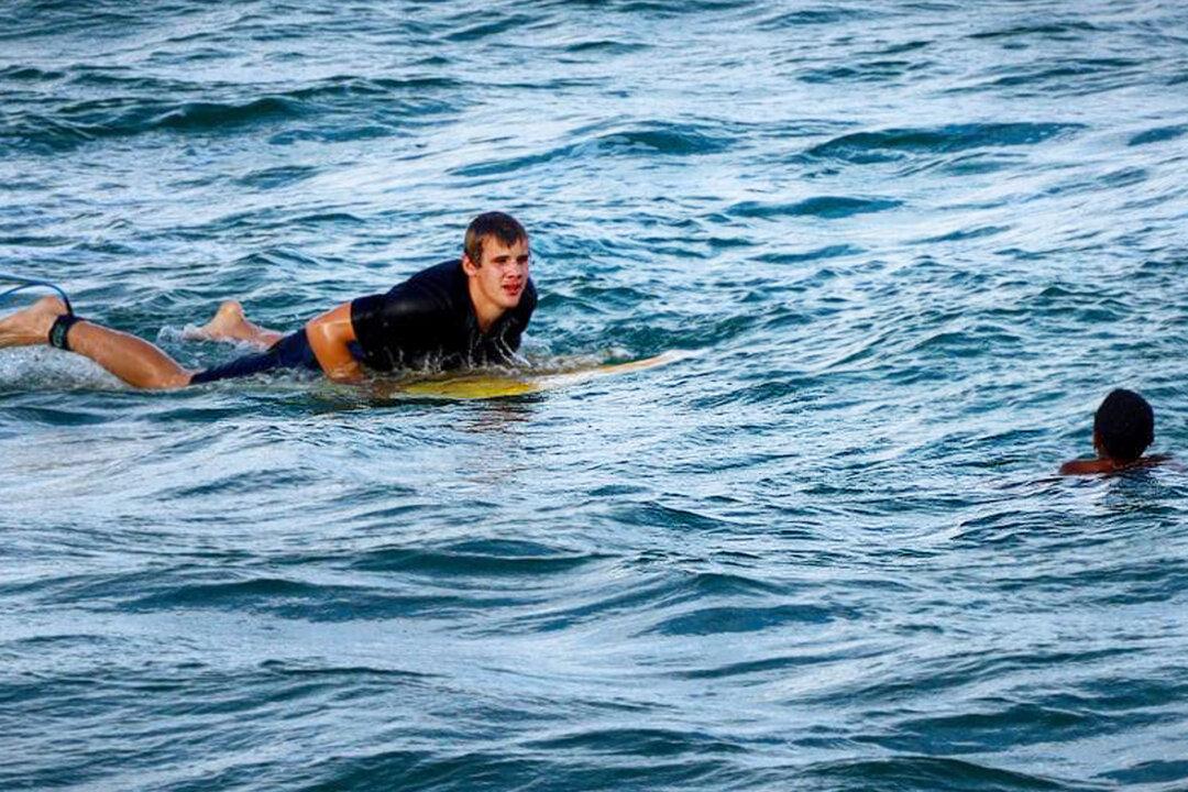 11-Year-Old Boy Caught in Riptide, Drowning, When Surfer Paddles to the Rescue, Saves His Life