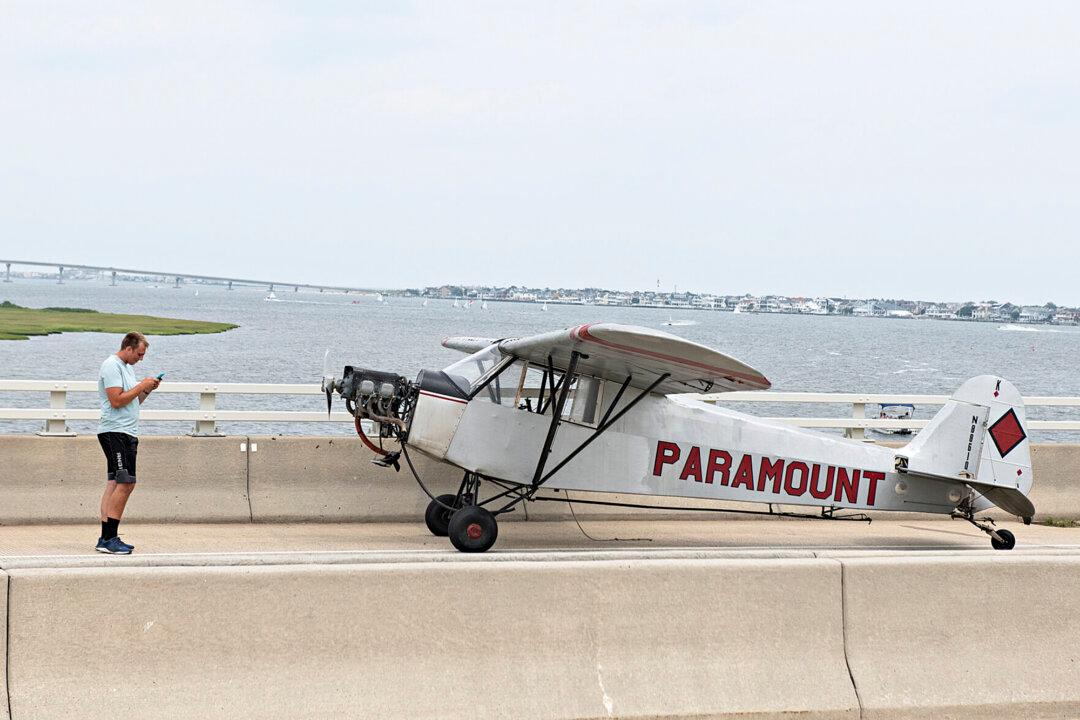 Pilot, 18, Lands Banner Plane on Bridge; No Injuries