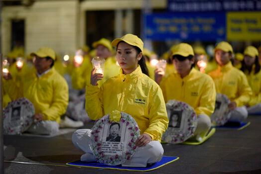 Falun Dafa practitioners commemorate lives lost and 20 years of persecution by the Chinese communist regime in Sydney, Australia, on July 19, 2019. (The Epoch Times)