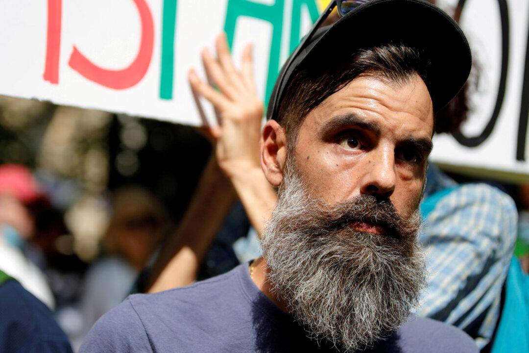 Anger Over COVID-19 Rules Gives New Impetus to France’s Yellow Vests