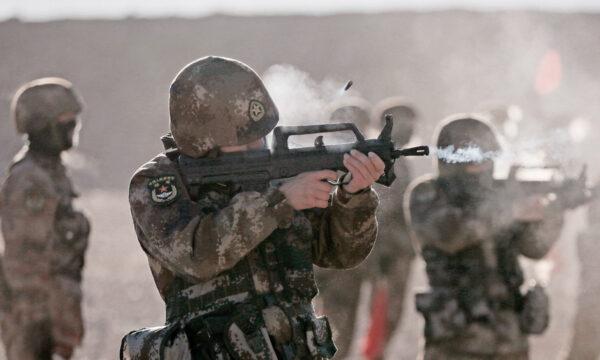 This photo taken on Jan. 4, 2021 shows Chinese People's Liberation Army (PLA) soldiers taking part in military training at Pamir Mountains in Kashgar, northwestern China's Xinjiang region. (STR/AFP via Getty Images)