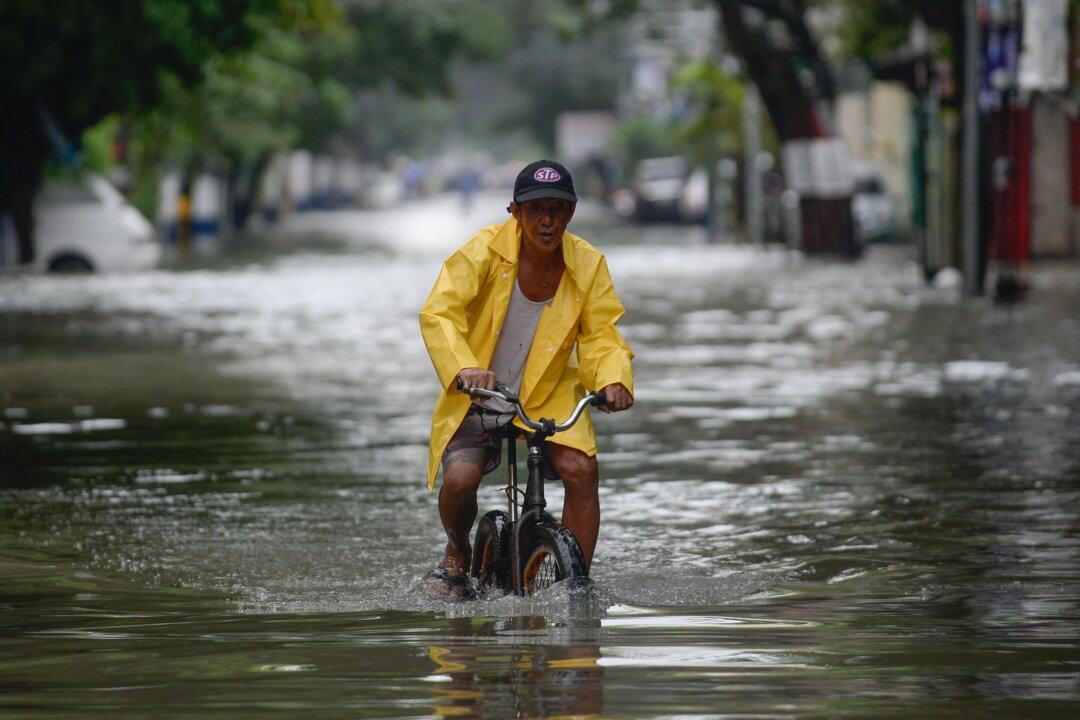 Philippines Evacuates Thousands as Monsoon Rains Flood Manila, Provinces