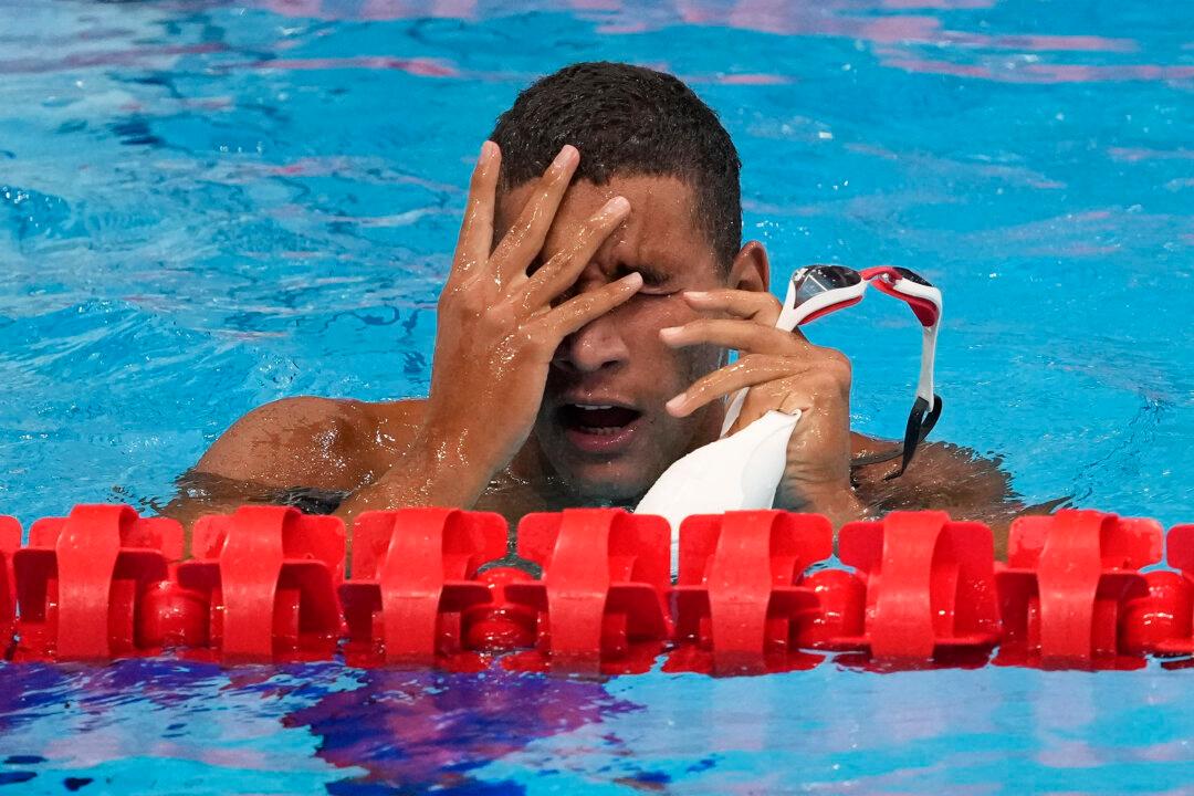 Tunisian Teen Wins Surprise Olympic Swimming Gold