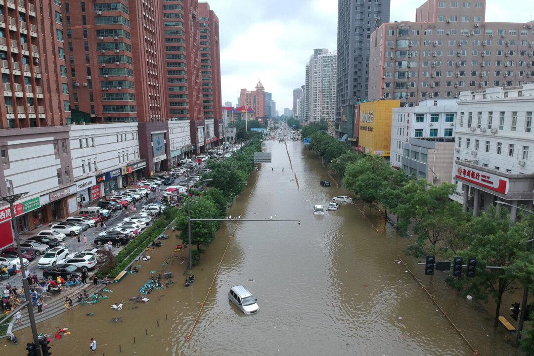 Mother Looks for Missing Daughter as Death Toll for China Floods in Question