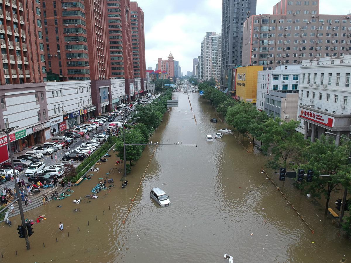 Mother Looks for Missing Daughter as Death Toll for China Floods in Question