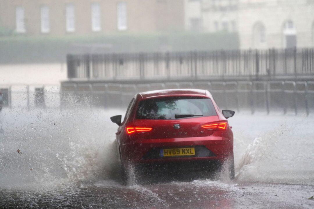 Homes, Roads, Hospitals Flooded as Storms Batter England’s South