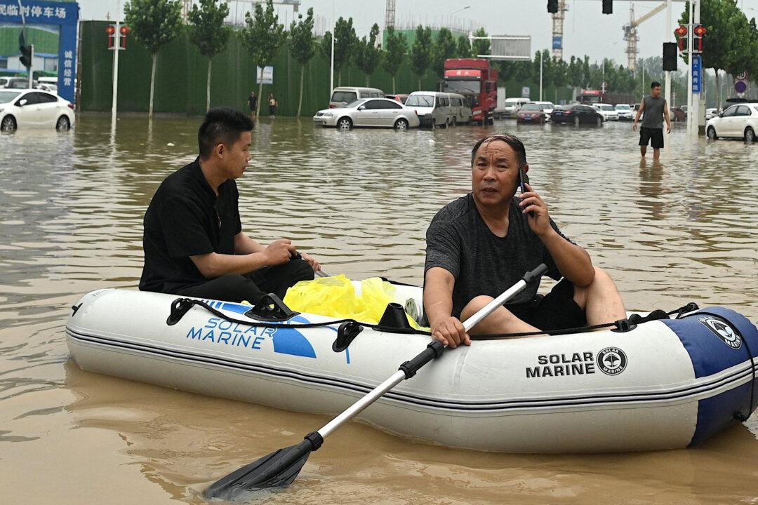 Highly Digitized Lifestyles Adds to Flood Woes in China