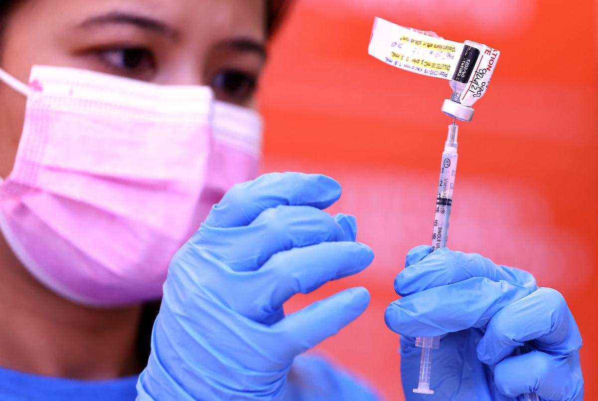 A registered nurse prepares a dose of the Pfizer COVID-19 vaccine in Wilmington, Calif., on July 29, 2021. (Mario Tama/Getty Images)