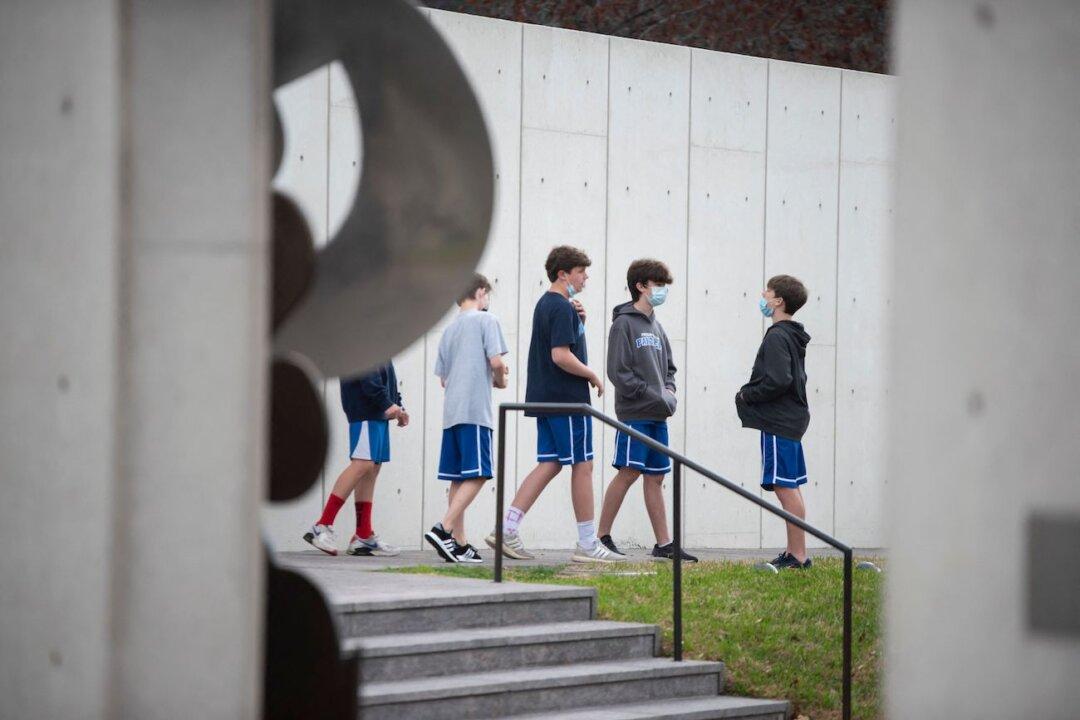 Biden Admin Launches Probe Into Texas Ban on School Mask Mandates