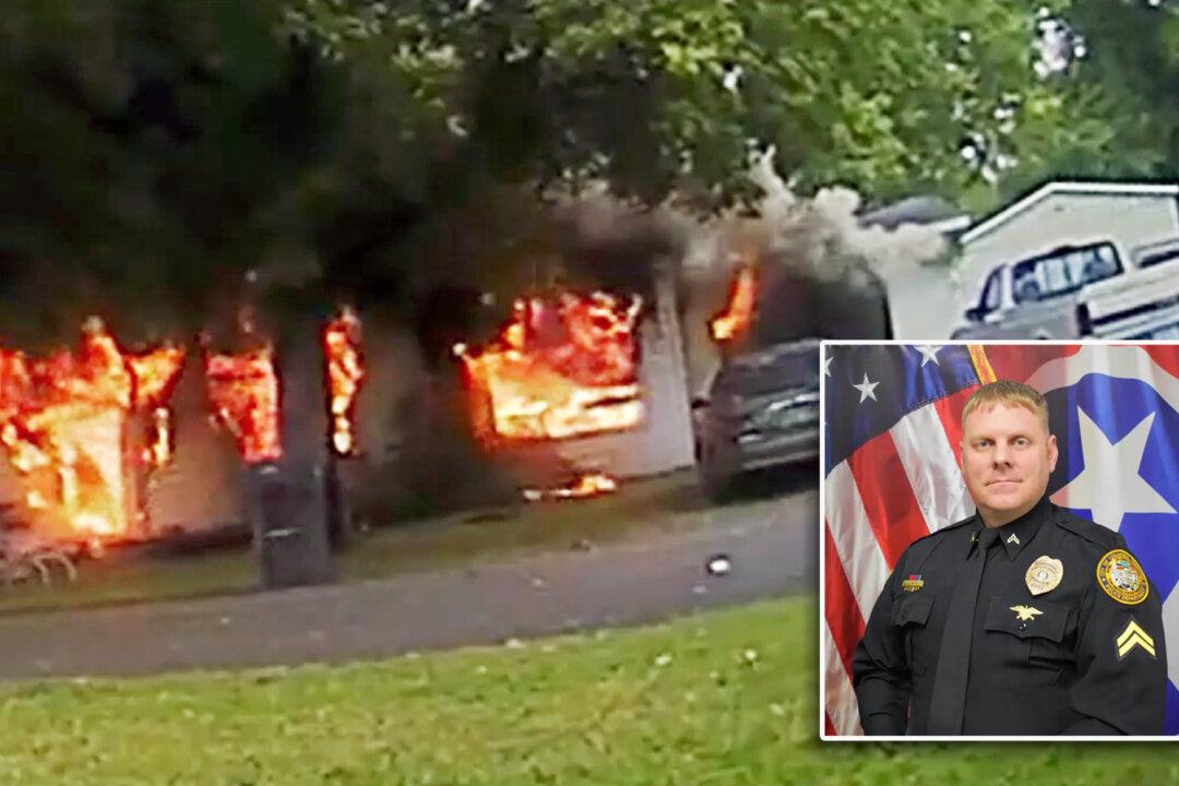 Bodycam Shows Tennessee Police Officer Run Into Explosive House Fire to Rescue Disabled Woman