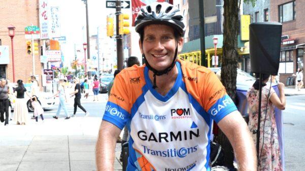 Douglas Moyer, a local German teacher who has had an experience of living in former East Germany, was so encouraged to see the brave people at the rally, voicing and supporting for freedom of Chinese people. (Frank Liang/The Epoch Times)