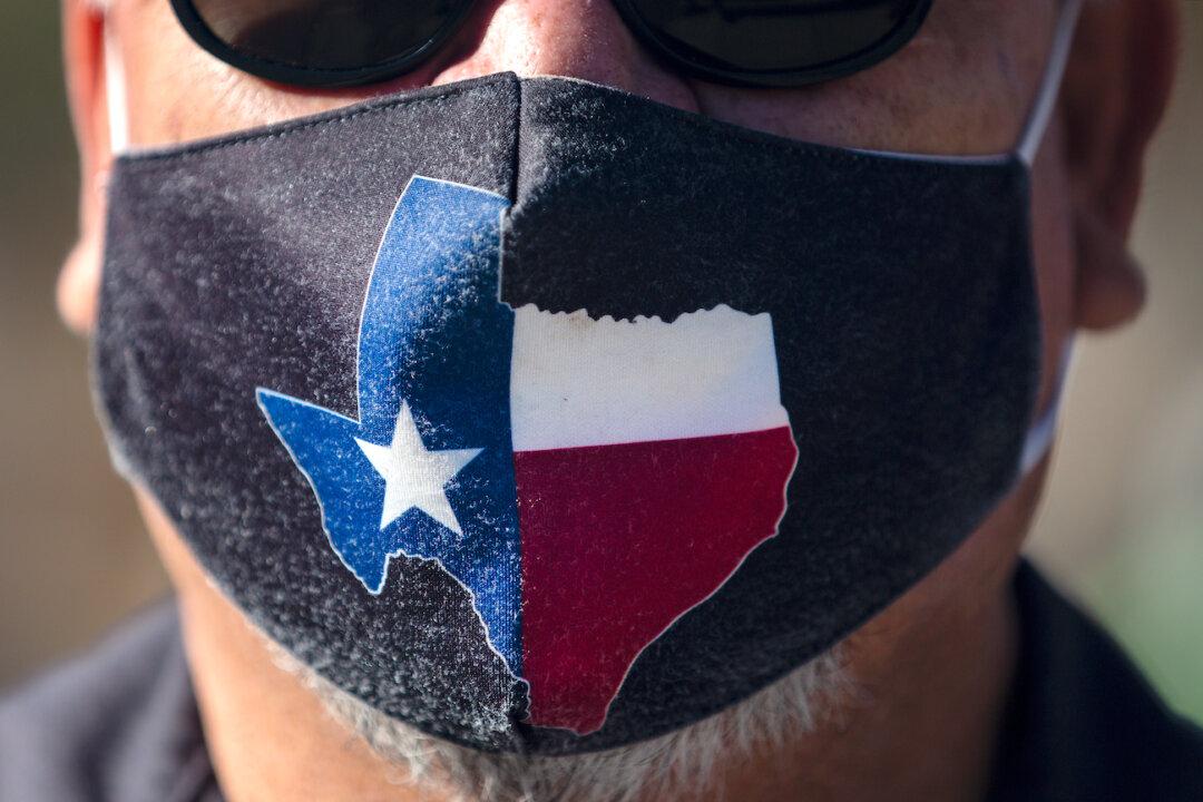 Texas Sues Biden Administration Over Federal Mask Mandate on Public Transport