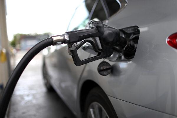 A gas pump fills a car with fuel at a gas station in San Rafael, Calif., on May 10, 2017. (Justin Sullivan/Getty Images)