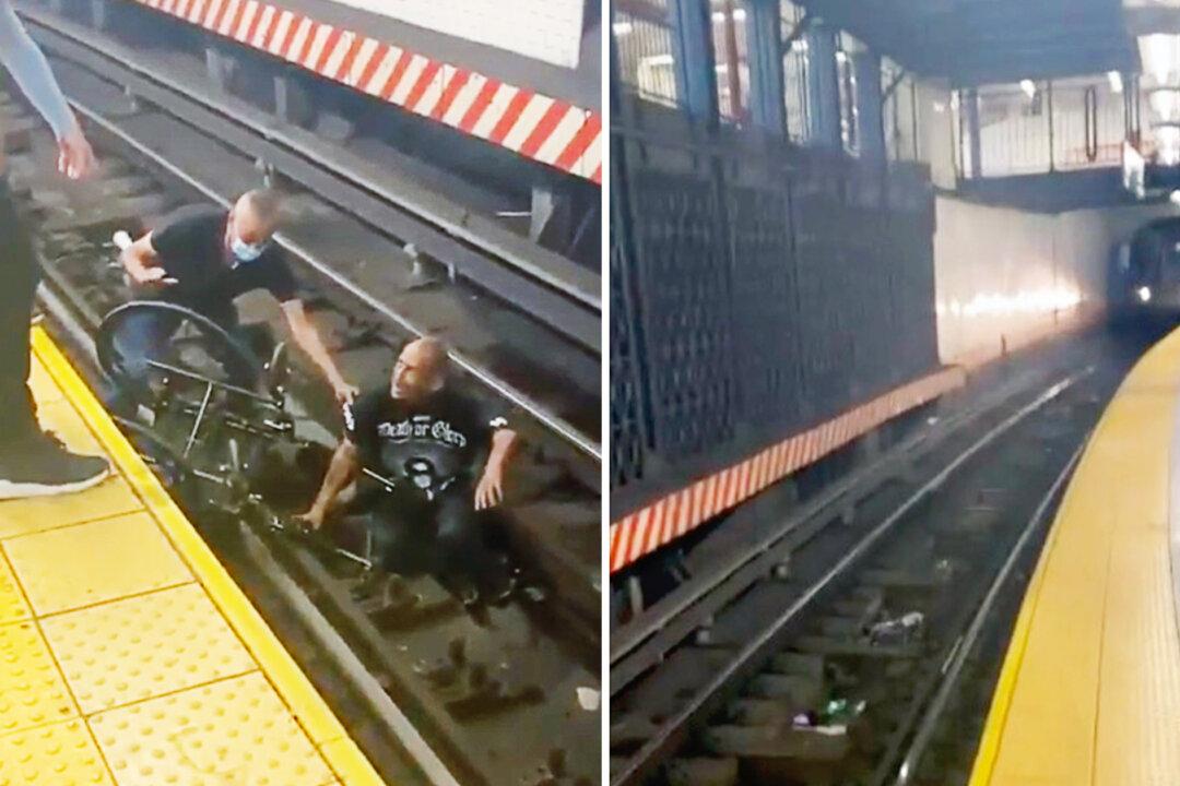 Video Shows Man in Wheelchair Fallen on Subway Train Tracks, Good Samaritan Saving Him