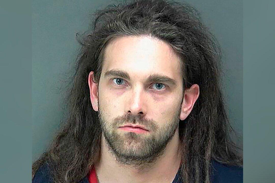 Man Pleads Guilty to Killing 2 Outside Indiana Factory