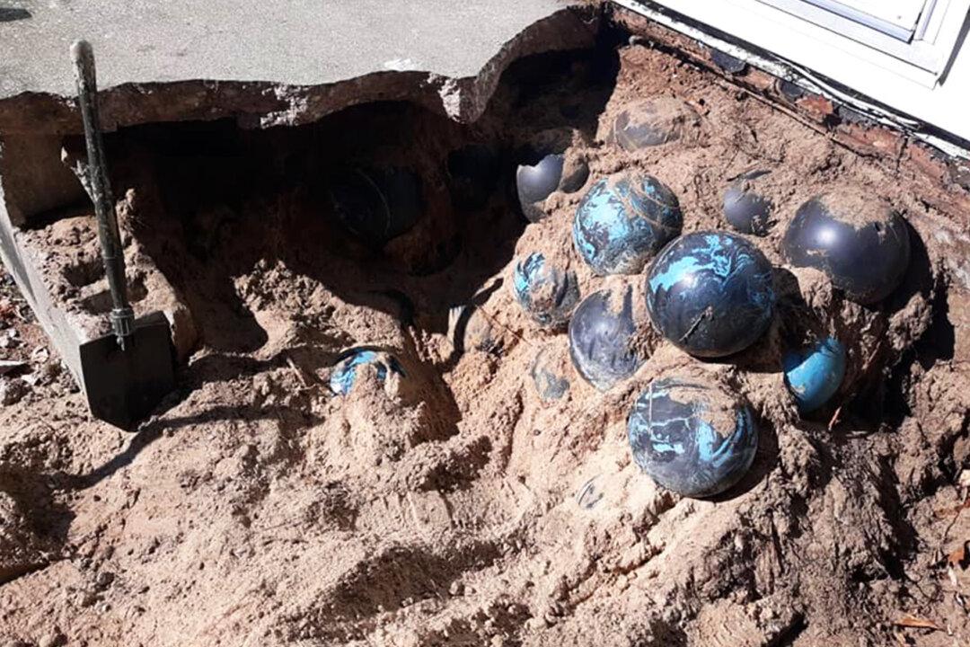 Michigan Man Finds 158 Bowling Balls Under His Concrete Steps During Summer Reno Project