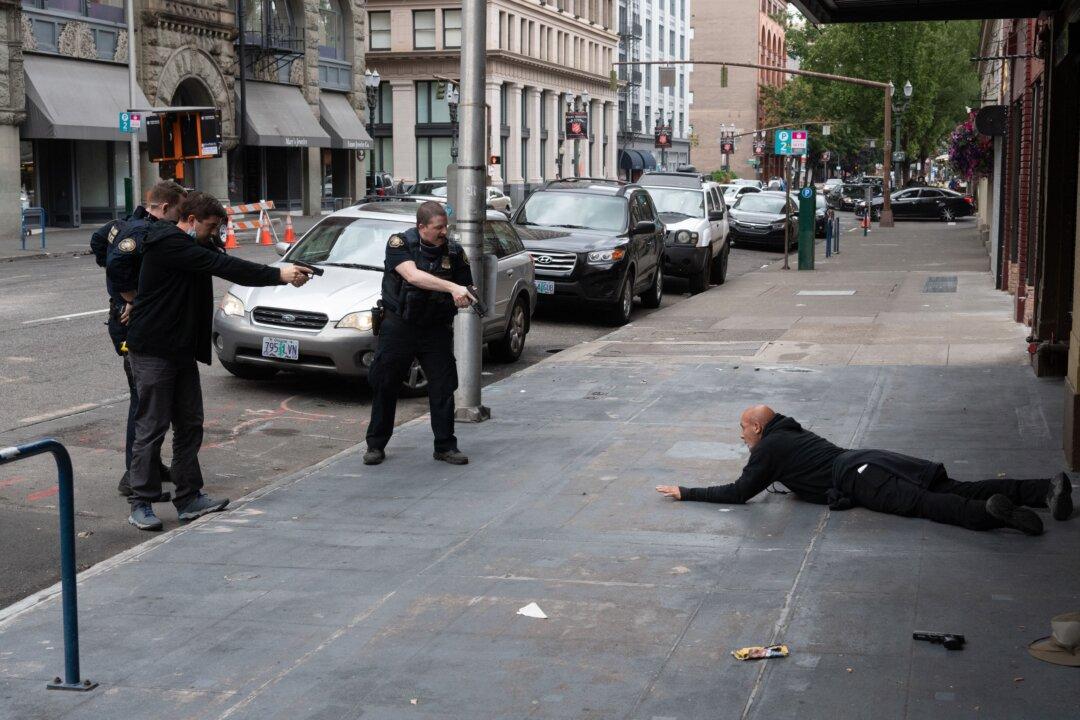 Portland Mayor Defends Policing Strategy After Street Brawls, Firefight