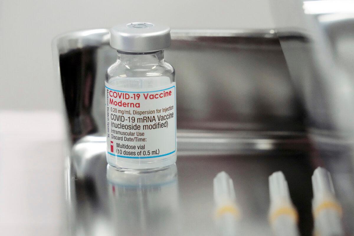 A view of a Moderna COVID-19 vaccine vial. (Eugene Hoshiko/AP Photo)