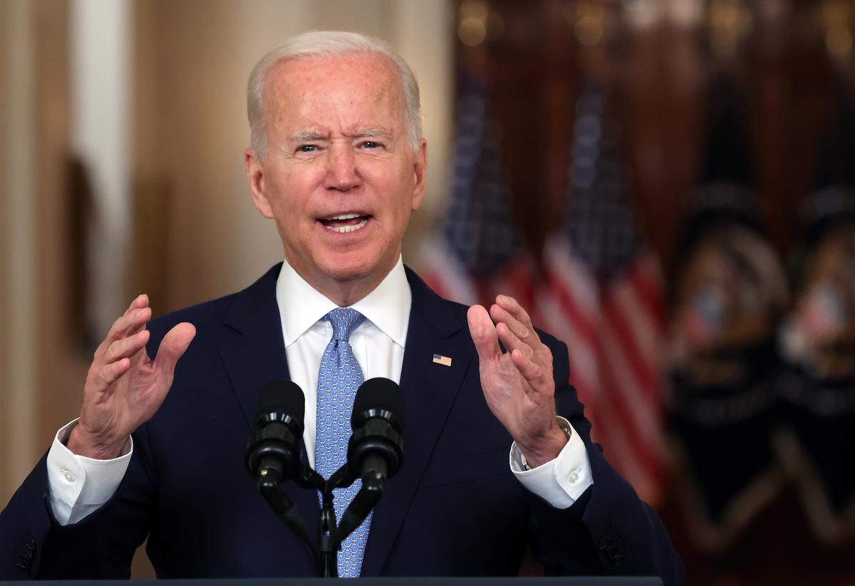 Biden Defends Ending Afghanistan Mission as Some Americans Get Left Behind